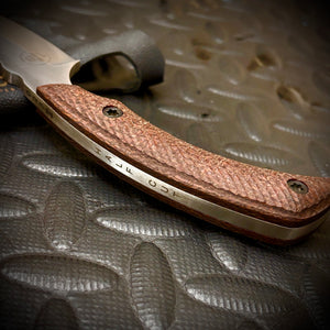 The HALF-CUT one off  (Canvas Micarta)