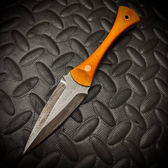 The Soucouyant  ( one off linen Micarta with copper tubes and pins )