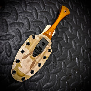 The Soucouyant  ( one off linen Micarta with copper tubes and pins )