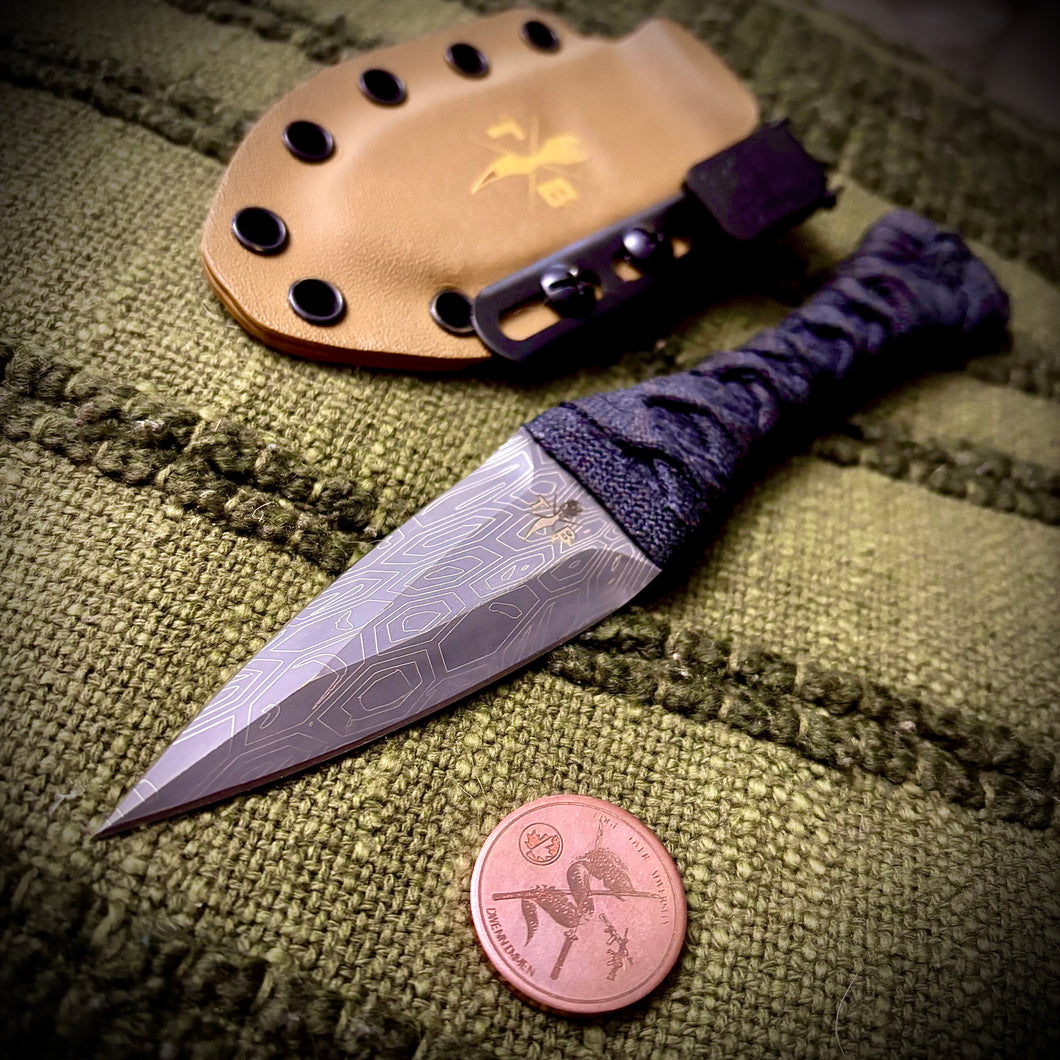 The Soucouyant (Epoxy Cord wrapped one off)