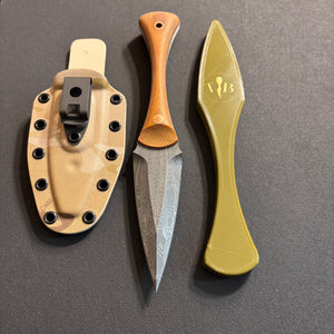 The Soucouyant  and trainer ( one off linen Micarta with copper tubes and pins )